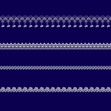 Beyaz dantel kurdeleler kümesi