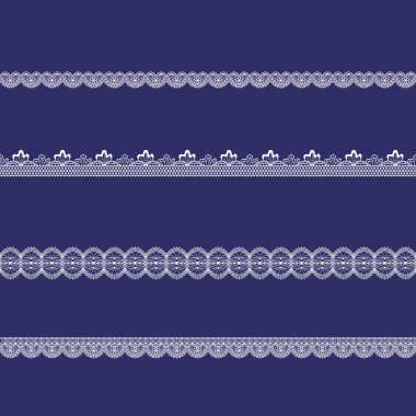 Beyaz dantel kurdeleler kümesi