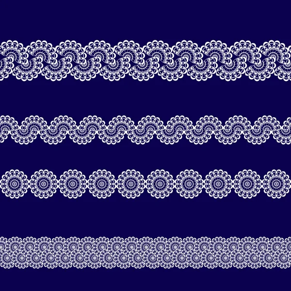 Beyaz dantel kurdeleler kümesi