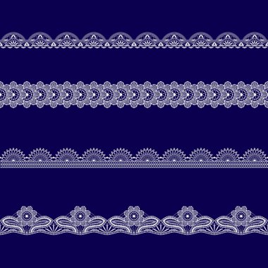 Beyaz dantel kurdeleler kümesi