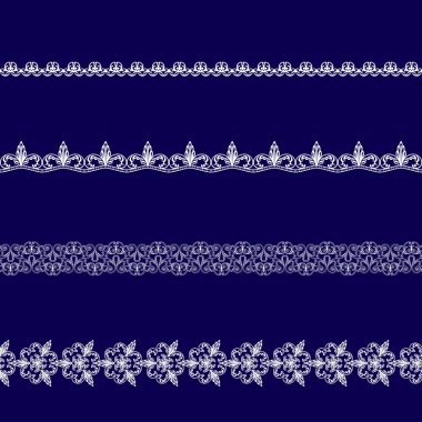 Beyaz dantel kurdeleler kümesi