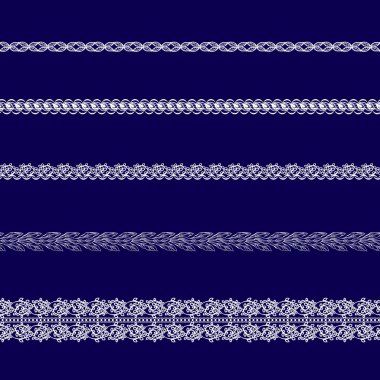 Beyaz dantel kurdeleler kümesi