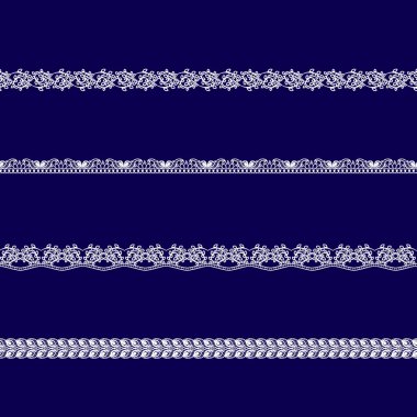 Beyaz dantel kurdeleler kümesi