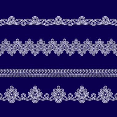 Beyaz dantel kurdeleler kümesi