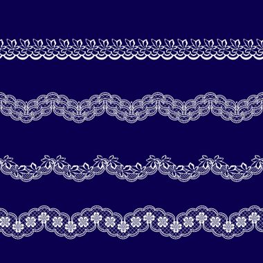 Beyaz dantel kurdeleler kümesi