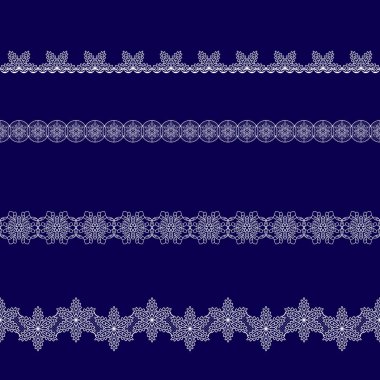 Beyaz dantel kurdeleler kümesi