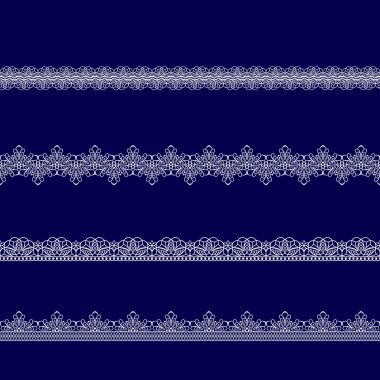 Beyaz dantel kurdeleler kümesi