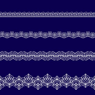 Beyaz dantel kurdeleler kümesi