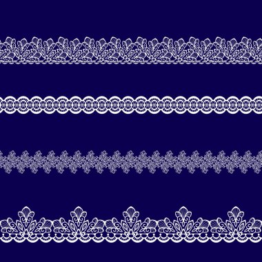 Beyaz dantel kurdeleler kümesi