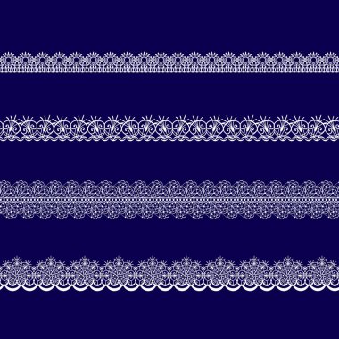 Beyaz dantel kurdeleler kümesi