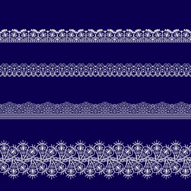 Beyaz dantel kurdeleler kümesi