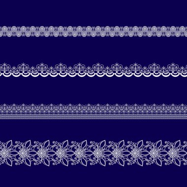 Beyaz dantel kurdeleler kümesi