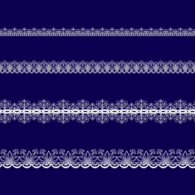 Beyaz dantel kurdeleler kümesi