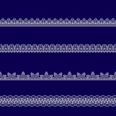 Beyaz dantel kurdeleler kümesi