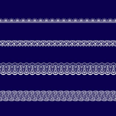 mavi bir arka plan üzerinde beyaz dantel kurdeleler kümesi