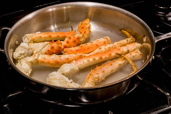 Crab legs being cooked — Stock Photo, Image