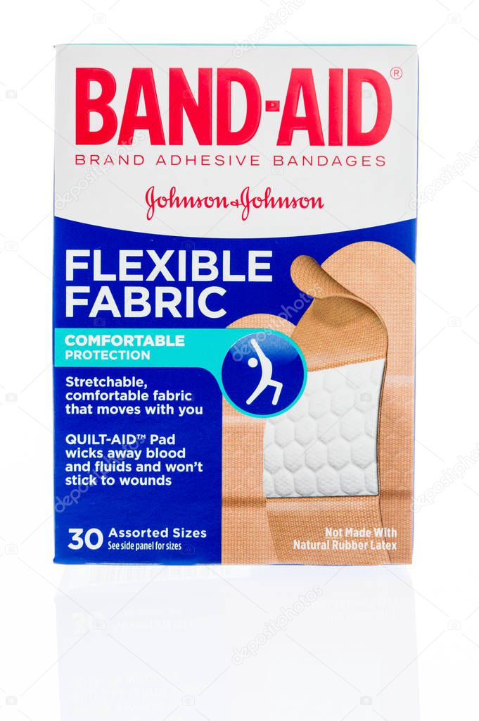 Winneconne, WI - 7 February 2018: A box of Band Aid flexible fabric strips on an isolated background.