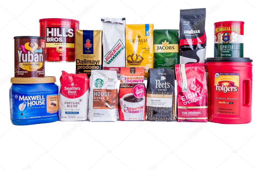 Winneconne, WI - 11 May 2018:  A collection of some of the most popular coffee brands around the world on an isolated background