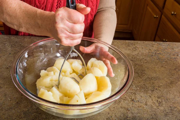 Mashing potato process — Stock Photo, Image