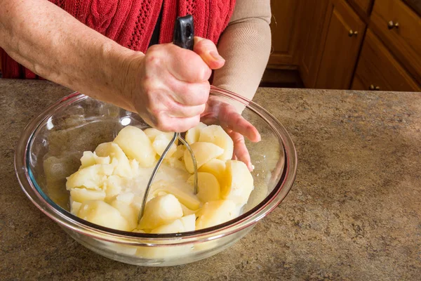 Mashing potato process — Stock Photo, Image