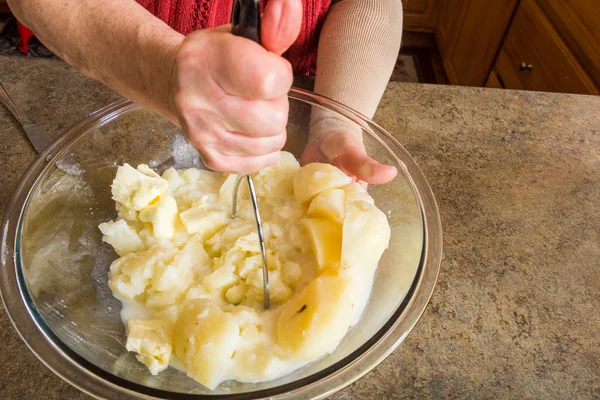 Mashing potato process — Stock Photo, Image