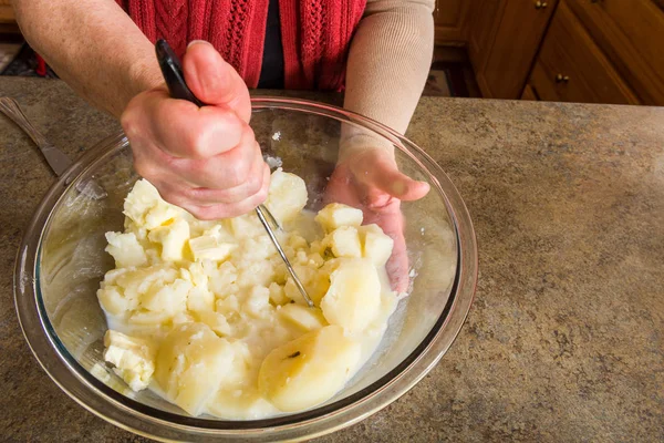 Mashing potato process — Stock Photo, Image