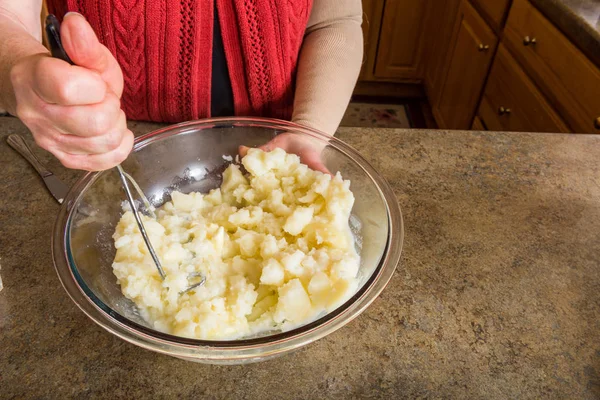 Mashing potato process — Stock Photo, Image