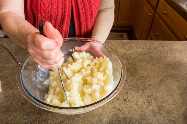 Mashing potato process — Stock Photo, Image
