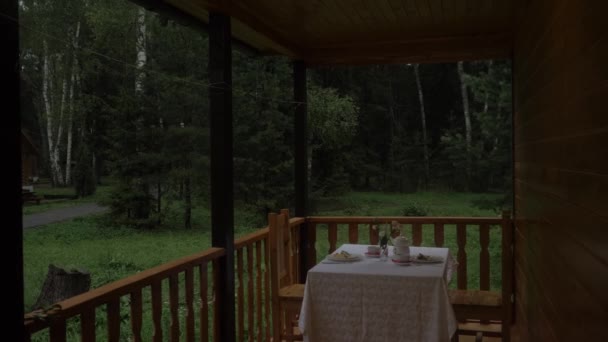 Breakfast table on the porch — Stock Footage Breakfast table on the porch Royalty Free Stock Video