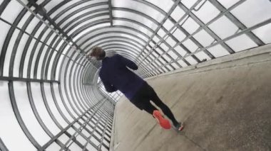 Running Man In Sportswear Workout Before Triathlon, Sprinting In Glass Tunnel. 