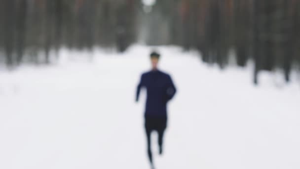 Close up portrait of jogger looking determined into camera, medium close. — Αρχείο Βίντεο