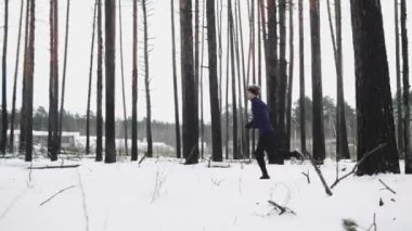 Running Man In Sportswear Workout Before Triathlon. Winter Sports Concept