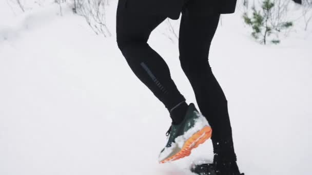 Running Man In Sportswear Workout Before Triathlon. Winter Sports Concept — Stock video