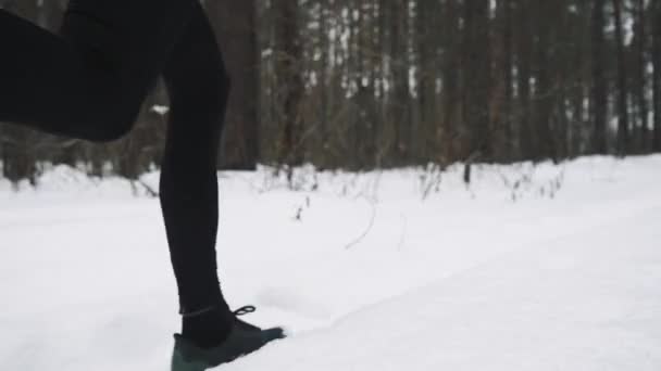 Running Man In Sportswear Workout Before Triathlon. Winter Sports Concept — Stock videók