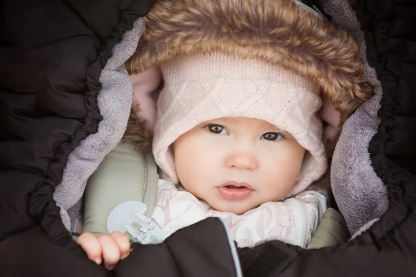 Eight months old baby girl wrapped and dressed in fur and winter — Stock Photo, Image