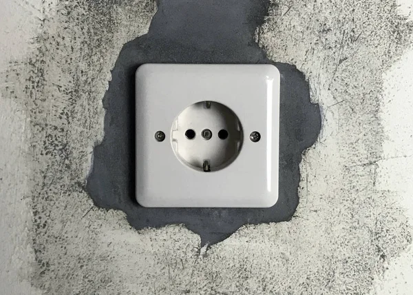 A wall socket installed at the construction