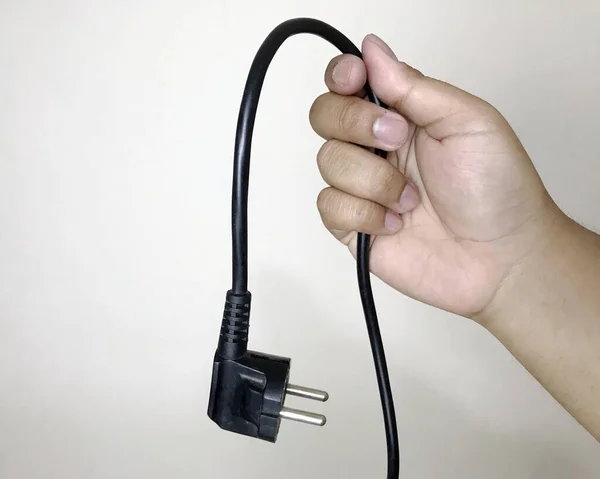 Primer Plano Una Mano Sosteniendo Cable Alimentación —  Fotos de Stock