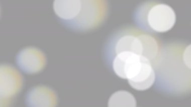 Bokeh 'i pastel gri arkaplanda hareket ettiriyor