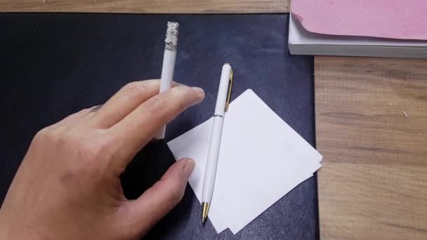 Person Smoking Cigarette Sitting Table Office — Stock Video