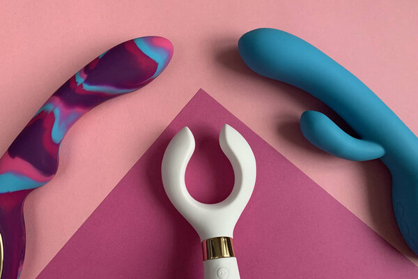Three sex toys on bright background. Vibrators for sex. Useful for sex shop or adults