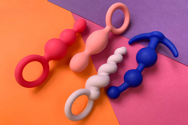 Sex toys. Many butt plags.  Color background. Useful for sex shop