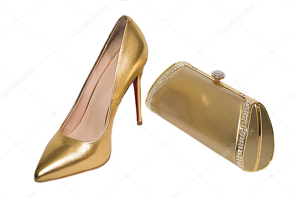 clutch and shoes in gold color