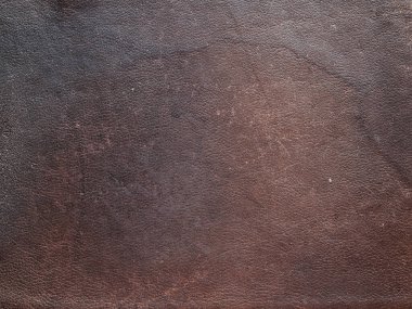 Texture of old shabby brown genuine cow leather