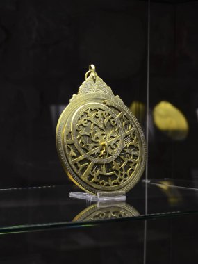 Istanbul, TURKEY, September 20, 2018. Ancient Arab bronze astrolabe. Museum of The History of Science and Technology in Islam.