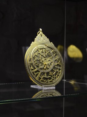 Istanbul, TURKEY, September 20, 2018. Ancient Arab bronze astrolabe. Museum of The History of Science and Technology in Islam. clipart