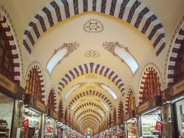 Istanbul, Turkey - September 20 - 2018: View of the vaulted ceiling of the Egyptian bazaar in Istanbul in perspective