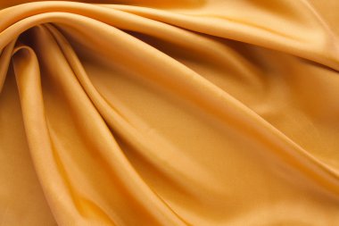 Altın kumaş dokusu arka plan