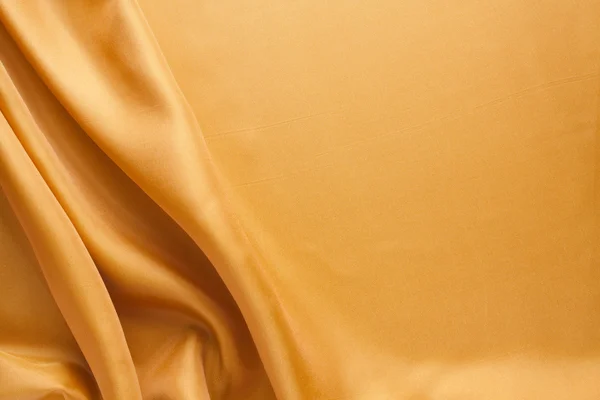 Fundo textura tecido de ouro — Fotografia de Stock