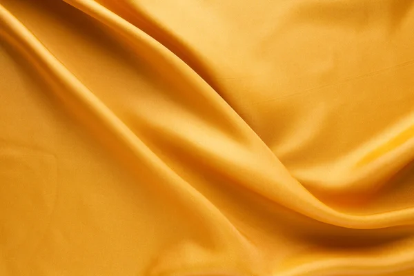 Fundo textura tecido de ouro — Fotografia de Stock