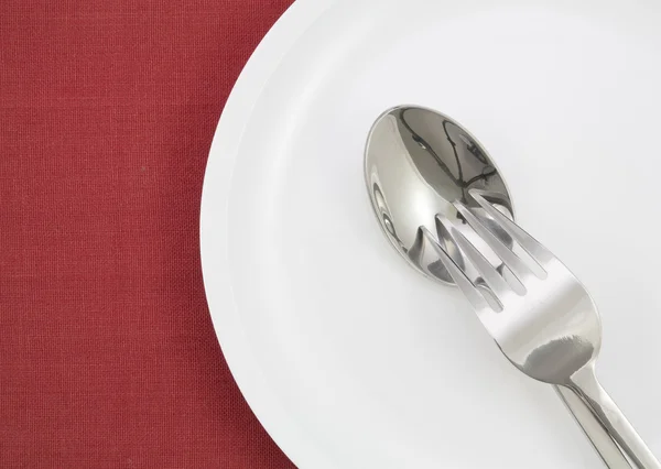 Teller mit Gabel und Messer — Stockfoto